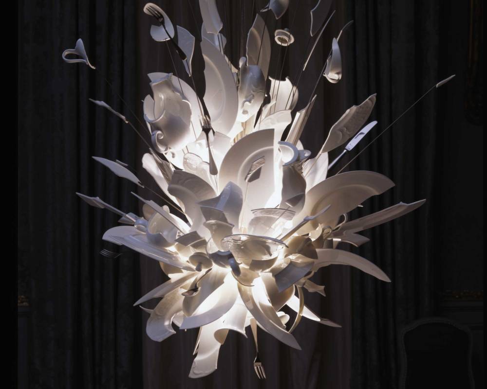 Chandelier made of broken porcelain and pieces of cutlery titled Porca Miseria