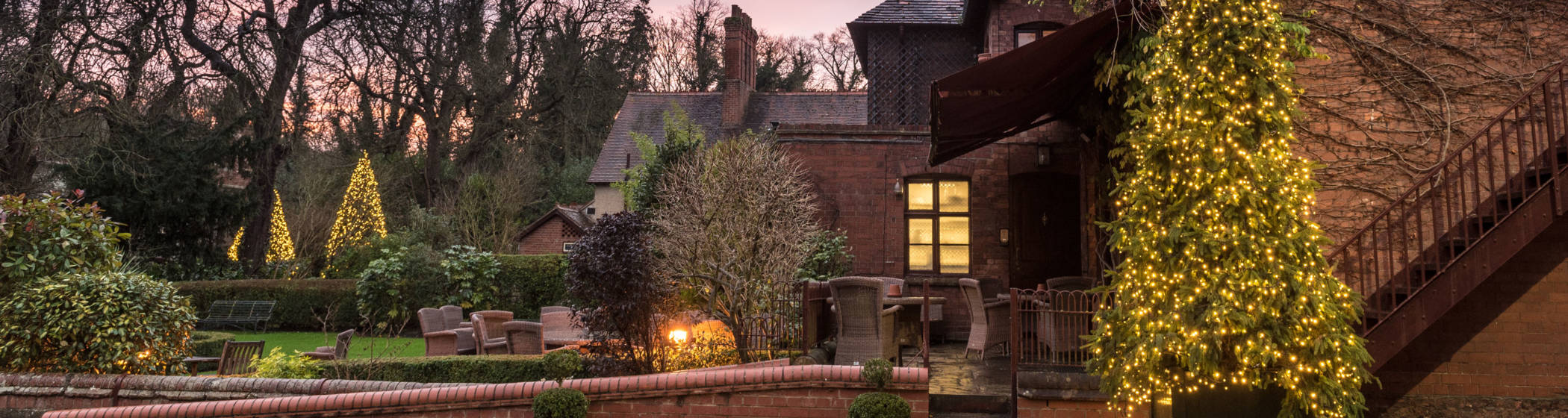 Exterior view of the Hotel courtyard with Christmas trees