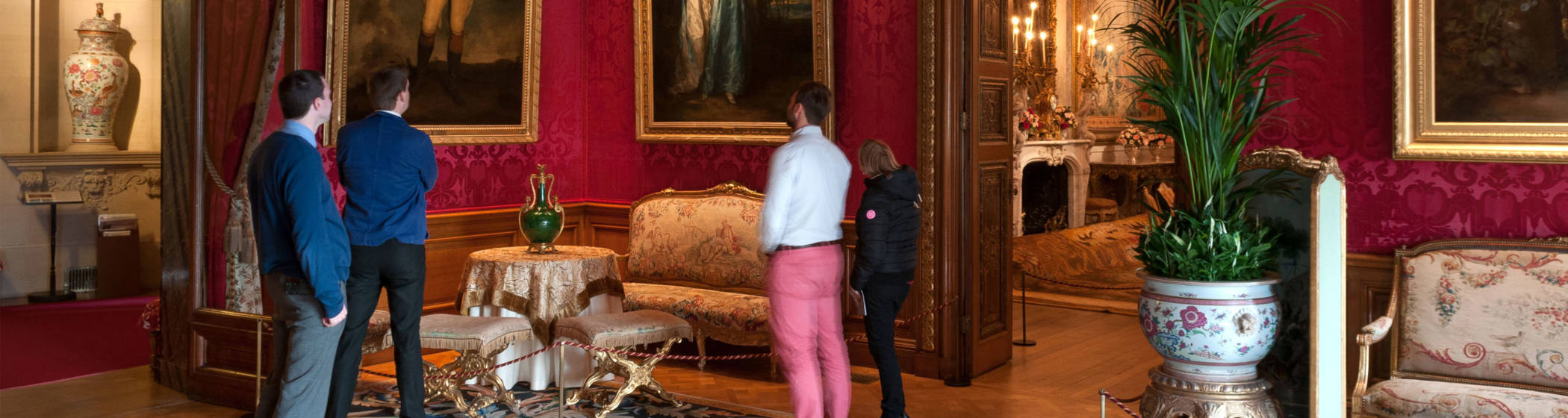 Visitors in the Red Drawing Room