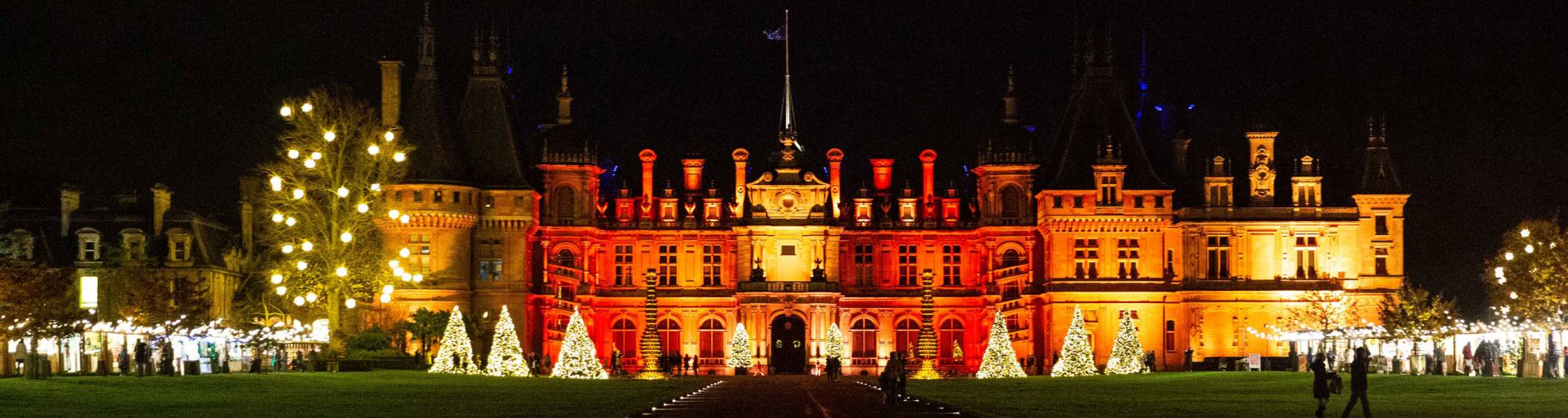 House illuminated in colour at Christmas
