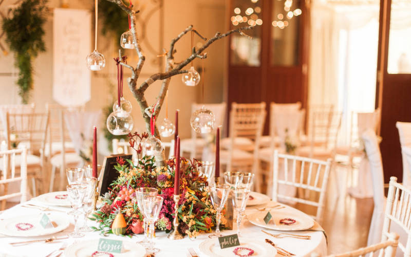 Weddings-Five-Arrows-Christmas-OCH-reception-table-empty-kate-nielen